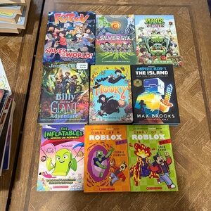 Collection of Graphic Novels and Books